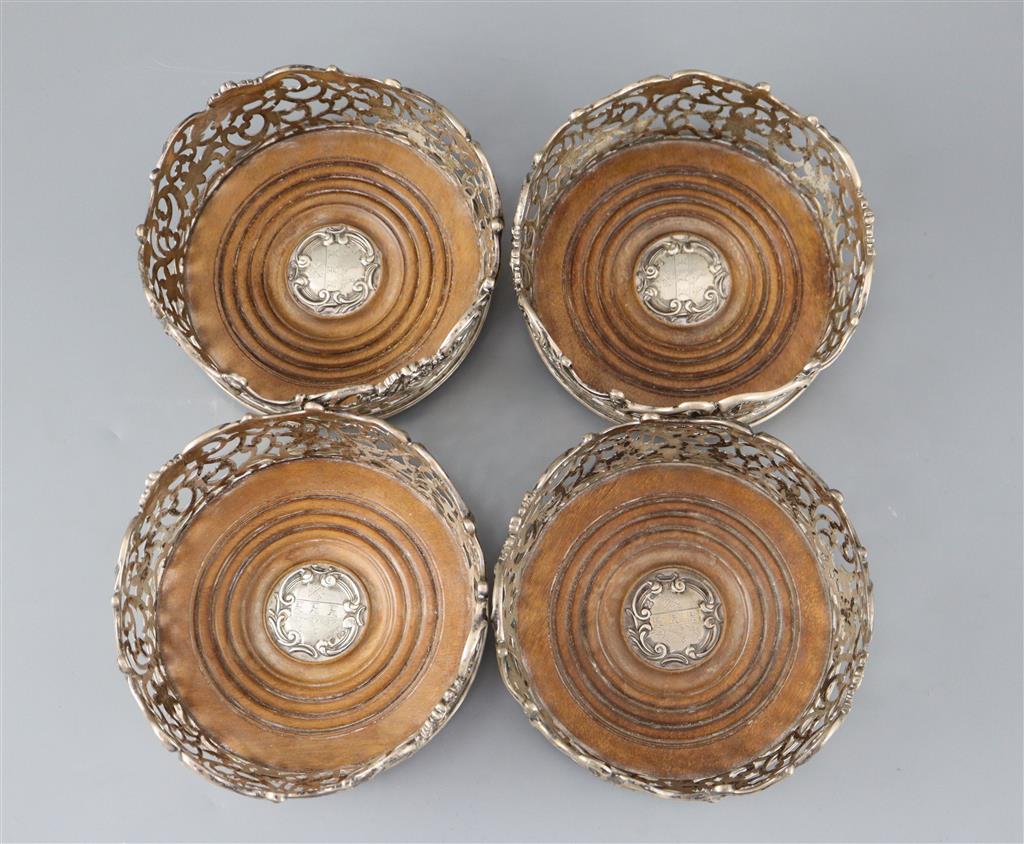 A good set of four early Victorian pierced silver wine coasters, by Joseph Angell I and Joseph Angell II,